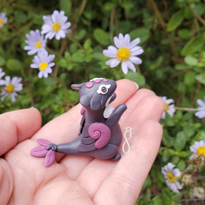 Purple Plumed Dragon