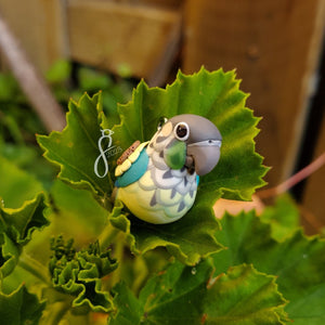 Turquoise Yellow-Sided Green Cheek Sunflower Charm