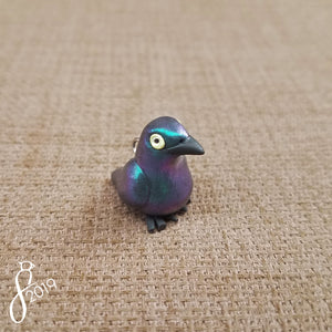 Glossy Starling Charm
